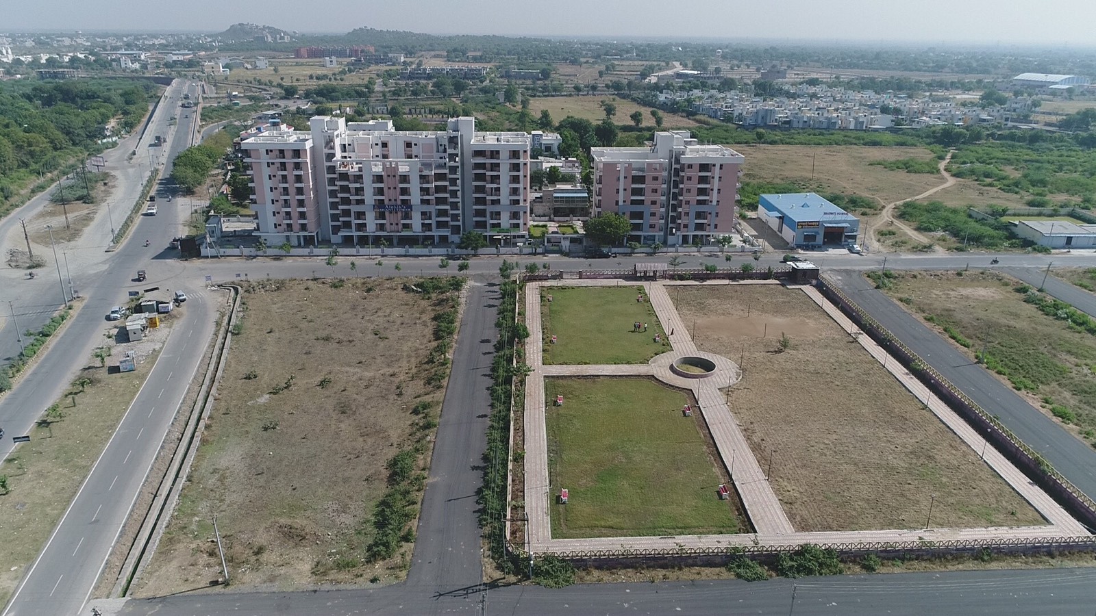 Shanti Tower towers and front garden from the air